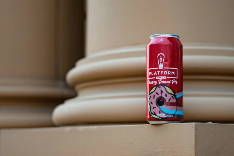 a can of pink donuts sitting on a ledge, inspired by Richmond Barthé, platform game, beer, flat desert, platform