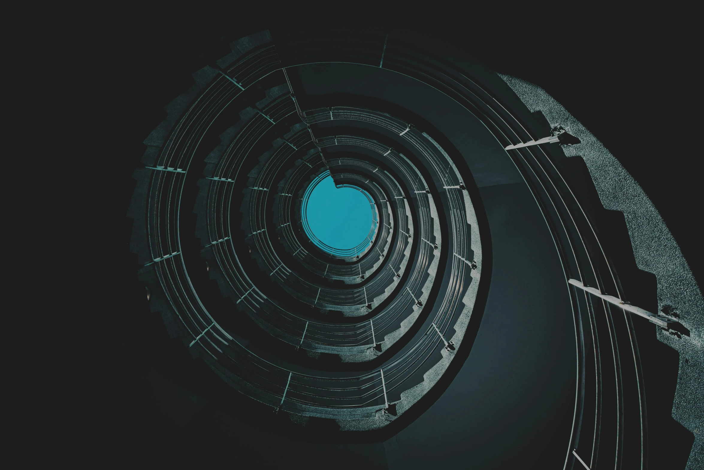 a spiral staircase with a blue light in the middle, an album cover, by Beeple, pexels contest winner, generative art, dark teal, black round hole, metal album cover, 3 d render n - 9