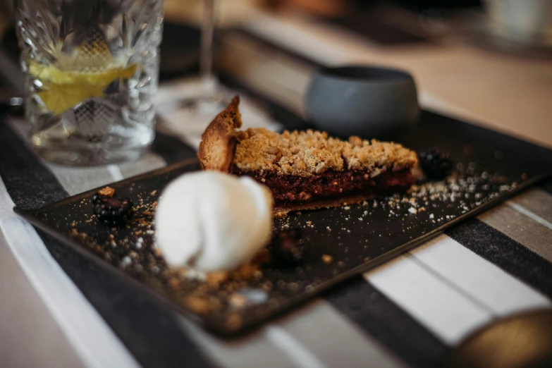 a close up of a plate of food on a table, by Lee Loughridge, unsplash, desserts, crispy, manuka, digging