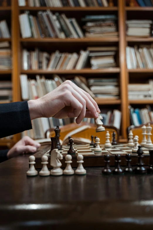 two men playing a game of chess in a library, unsplash, multiple stories, full frame image, a wooden, thumbnail