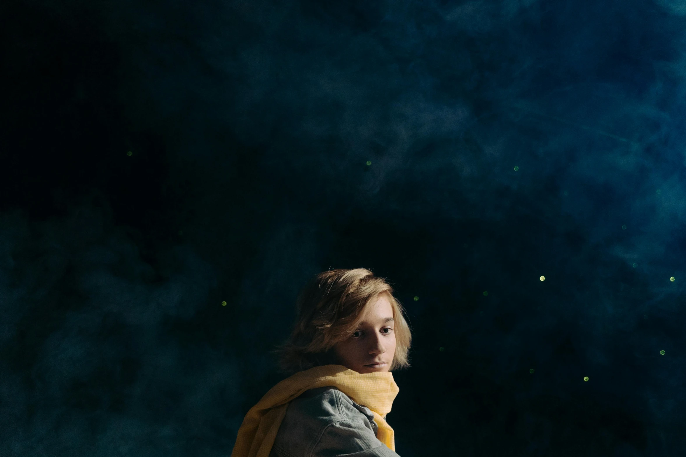 a woman sitting on a motorcycle with a yellow scarf around her neck, an album cover, inspired by roger deakins, trending on pexels, magical realism, standing in outer space, kiernan shipka, color photograph portrait 4k, calm night. over shoulder shot