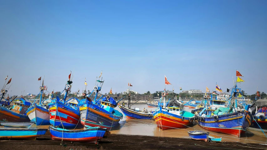 a group of boats sitting on top of a beach, colorful photograph, fishing village, avatar image, profile image