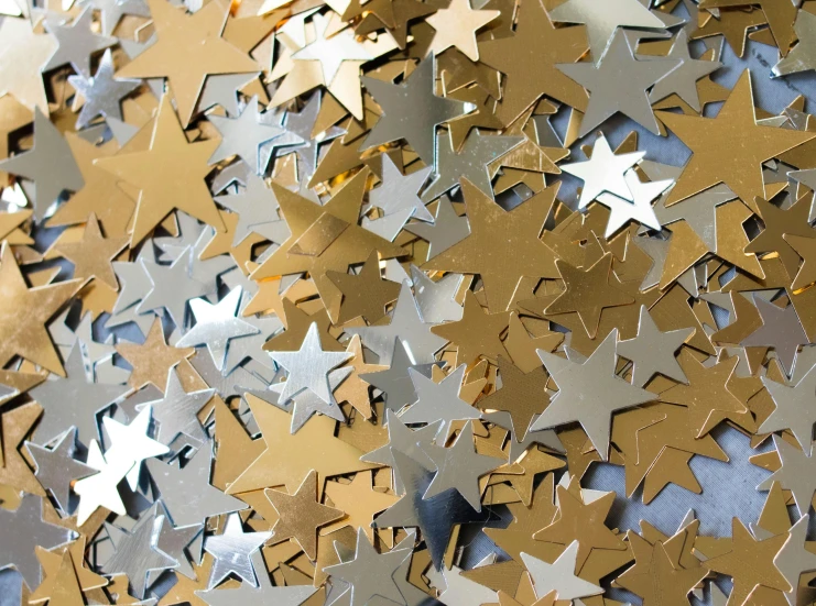 a pile of gold and silver star confetti, by Bradley Walker Tomlin, star charts, thumbnail, closeup