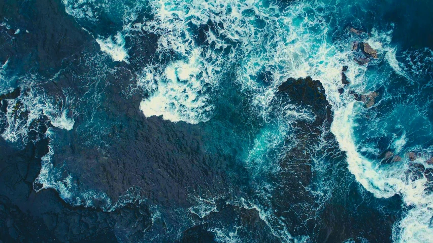 a view of the ocean from above, an album cover, pexels, process art, waves of energy, mariana trench, overflowing energy, movie