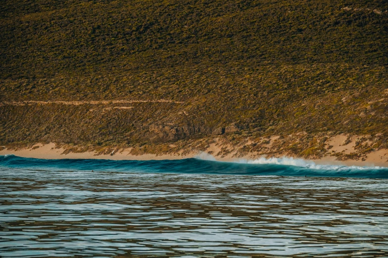 a man riding a wave on top of a surfboard, by Lee Loughridge, unsplash, fine art, in socotra island, panoramic, fan favorite, aussie