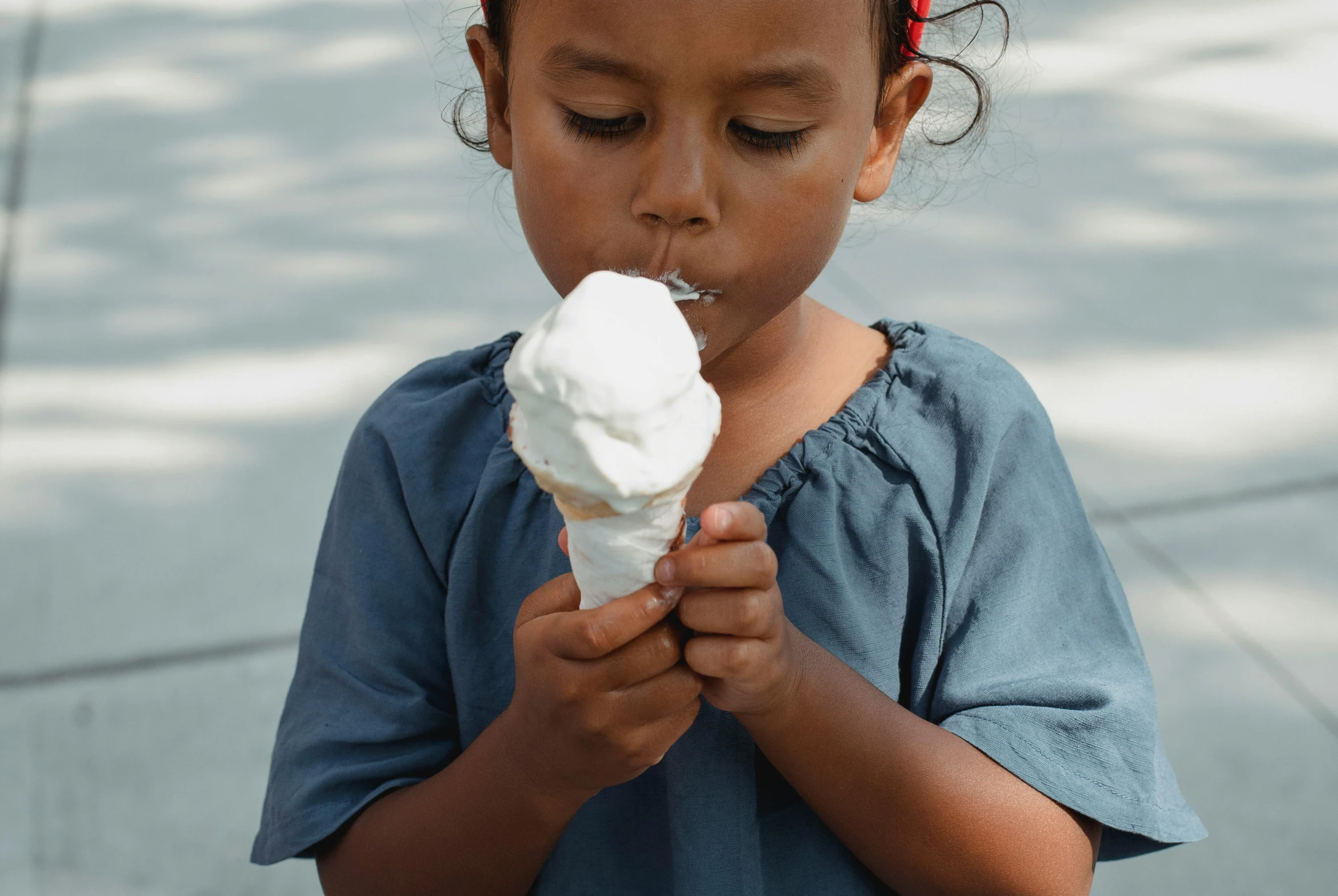 a little girl eating an ice cream cone, pexels contest winner, white, thumbnail, 5k, seasonal