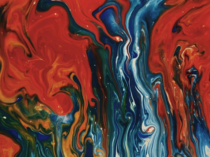 a close up of a painting on a red surface, inspired by Morris Louis Bernstein, pexels contest winner, swirling liquids, dark blue and red, instagram post, fiery coloring