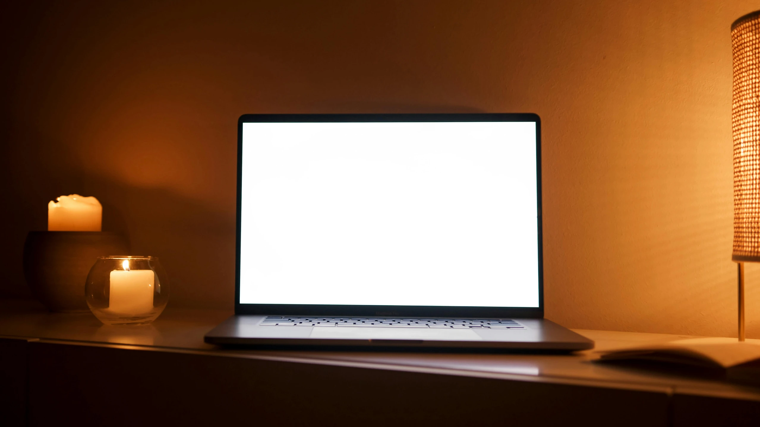 a laptop computer sitting on top of a wooden desk, by Carey Morris, pexels, no lights in bedroom, glowing screen, gradient brown to white, rectangle