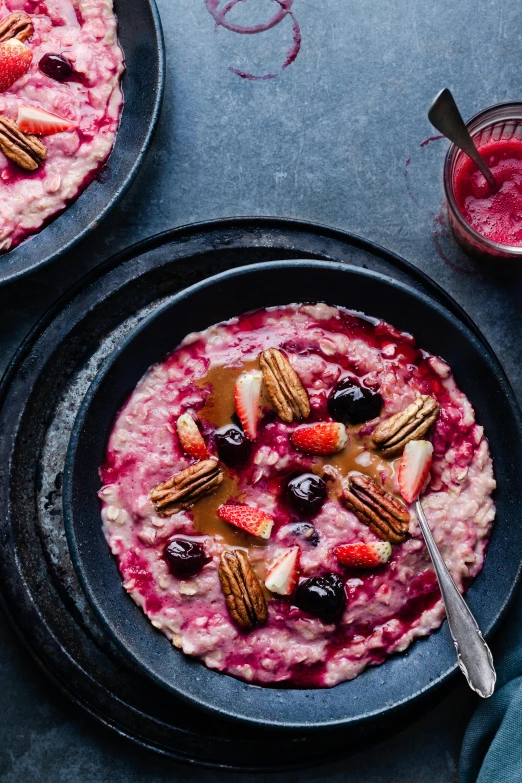 two bowls of oatmeal topped with berries and pecans, a portrait, renaissance, pink, thumbnail, london, sauce