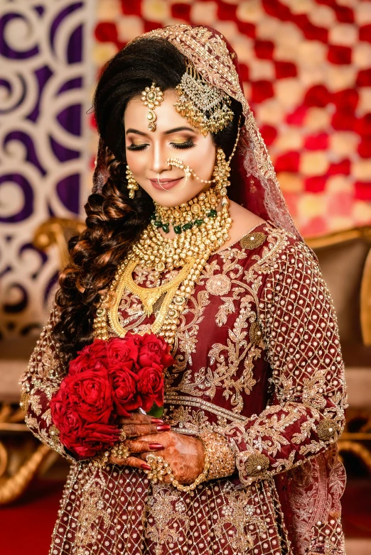 a bride in a red and gold outfit holding a bouquet, by Riza Abbasi, pexels contest winner, square, elaborate hair worn up, muslim, slide show