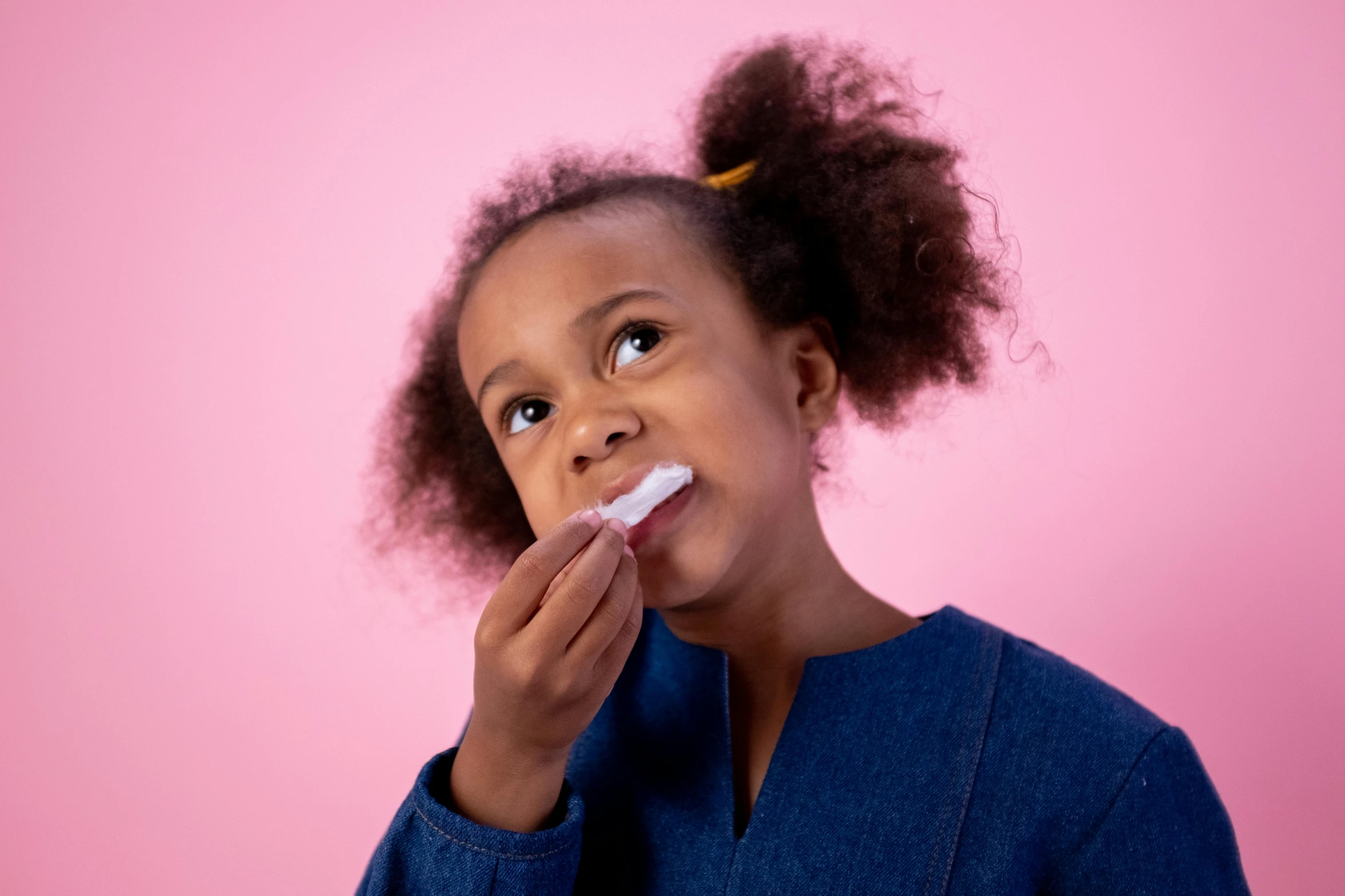 a little girl brushing her teeth with a toothbrush, by Daniel Seghers, happening, photoshoot for skincare brand, afro comb, marshmallow, thumbnail