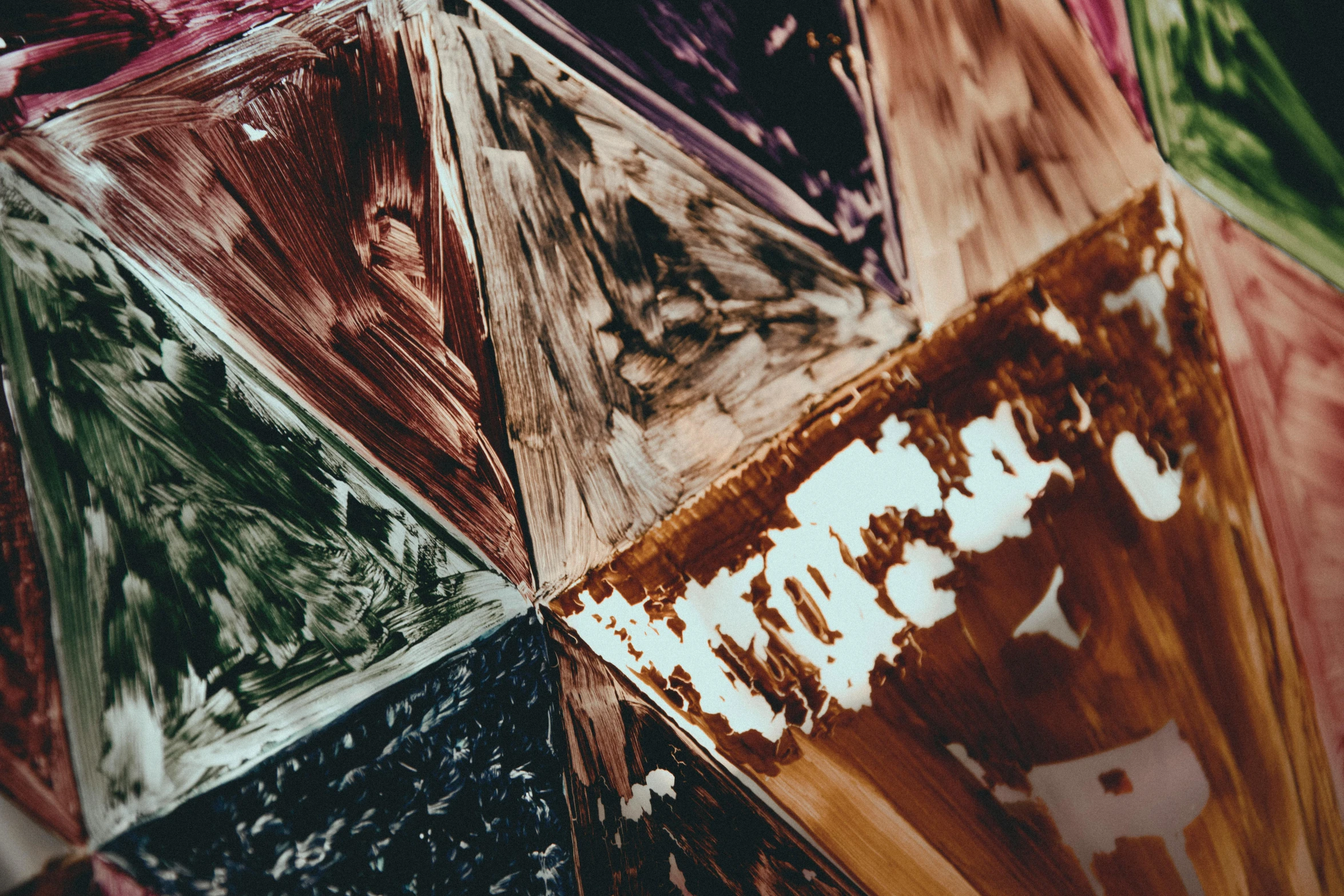 a close up of a person holding an umbrella, inspired by Kenneth Noland, trending on pexels, abstract expressionism, chocolate art, glass paint, deep colours