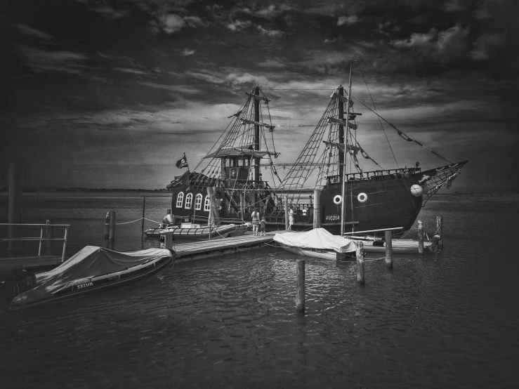 a black and white photo of a boat docked at a dock, by Dave Melvin, pixabay contest winner, renaissance, pirate neon ship, large scale photo, detailed medium format photo, fantasy land