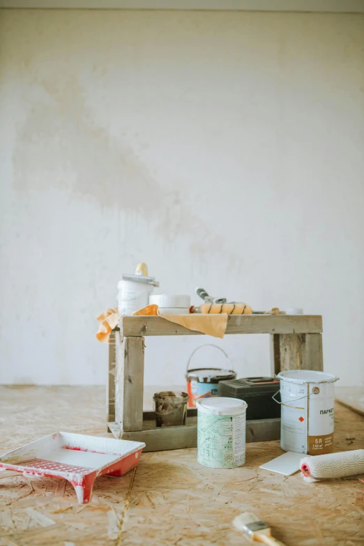 a room that has some paint and tools on the floor, a painting, trending on unsplash, arte povera, white background”, jar on a shelf, low quality photo, 15081959 21121991 01012000 4k