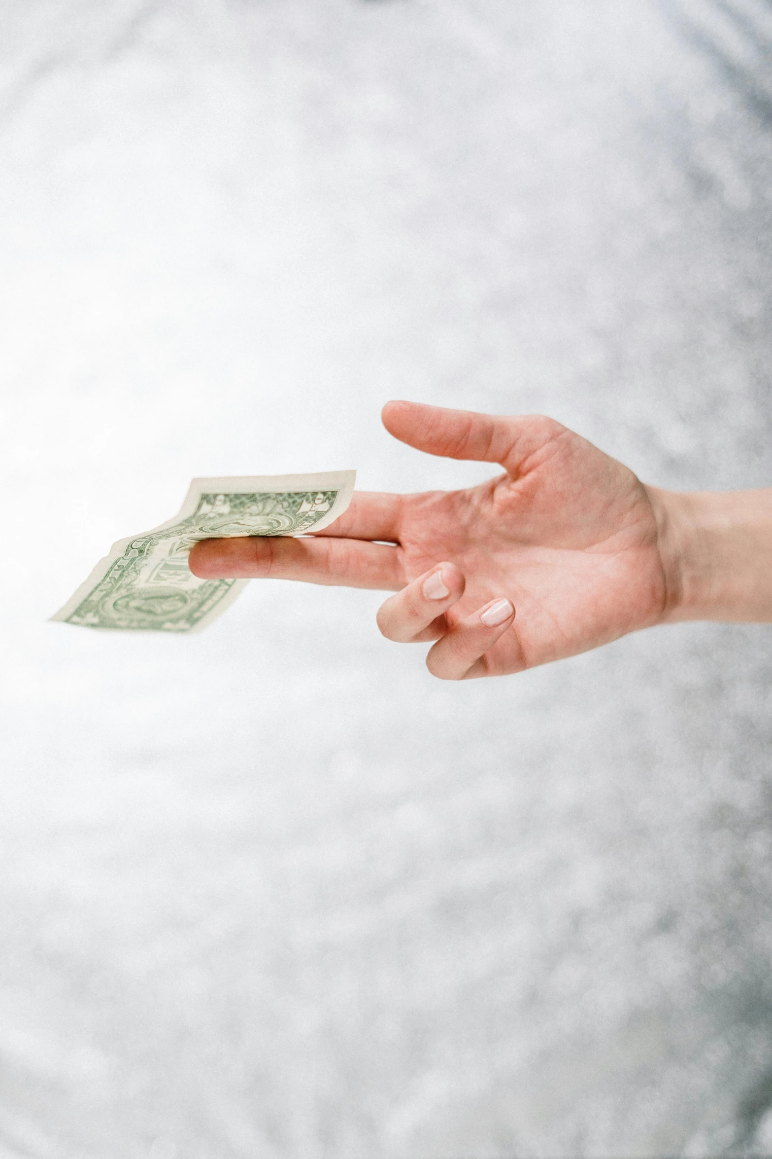 a person handing a dollar to another person, an etching, pexels contest winner, holographic material, with a white background, mid air shot, brett goldstein