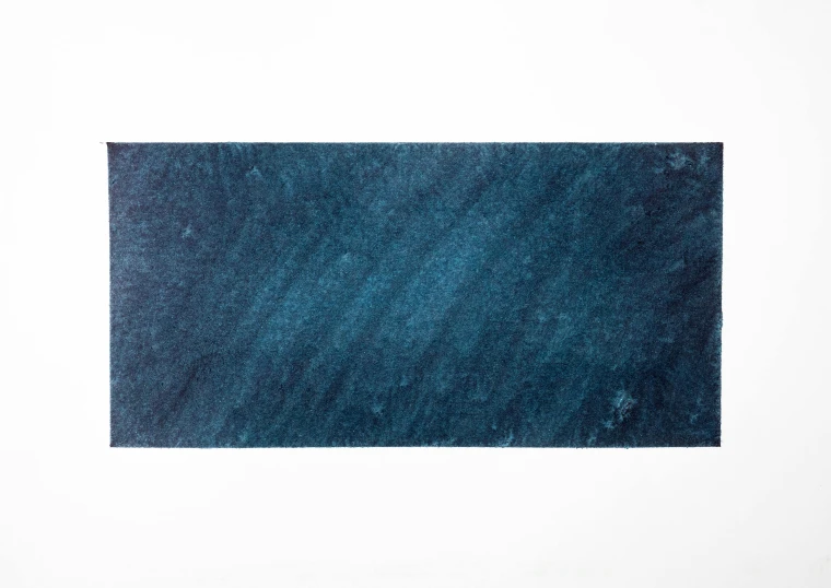 a piece of blue paper sitting on top of a table, inspired by Brice Marden, arte povera, dark grey carpet, 4k —height 1024 —width 1024, panoramic shot, chalked