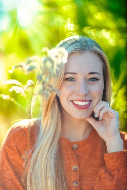 a beautiful blonde woman with a flower in her hair, a portrait, by Sven Erixson, unsplash, square, orange, sunlit, sydney sweeney