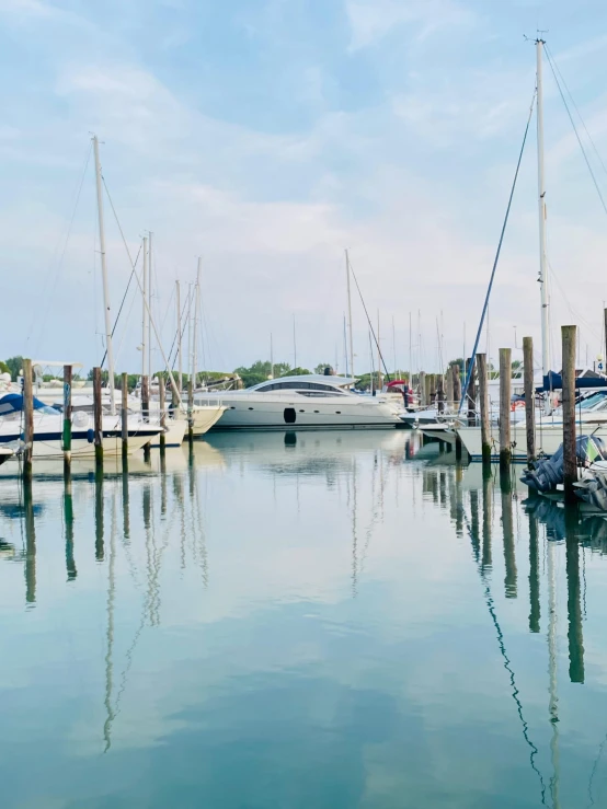 a number of boats in a body of water, from wheaton illinois, fan favorite, shot onfilm, 4k image