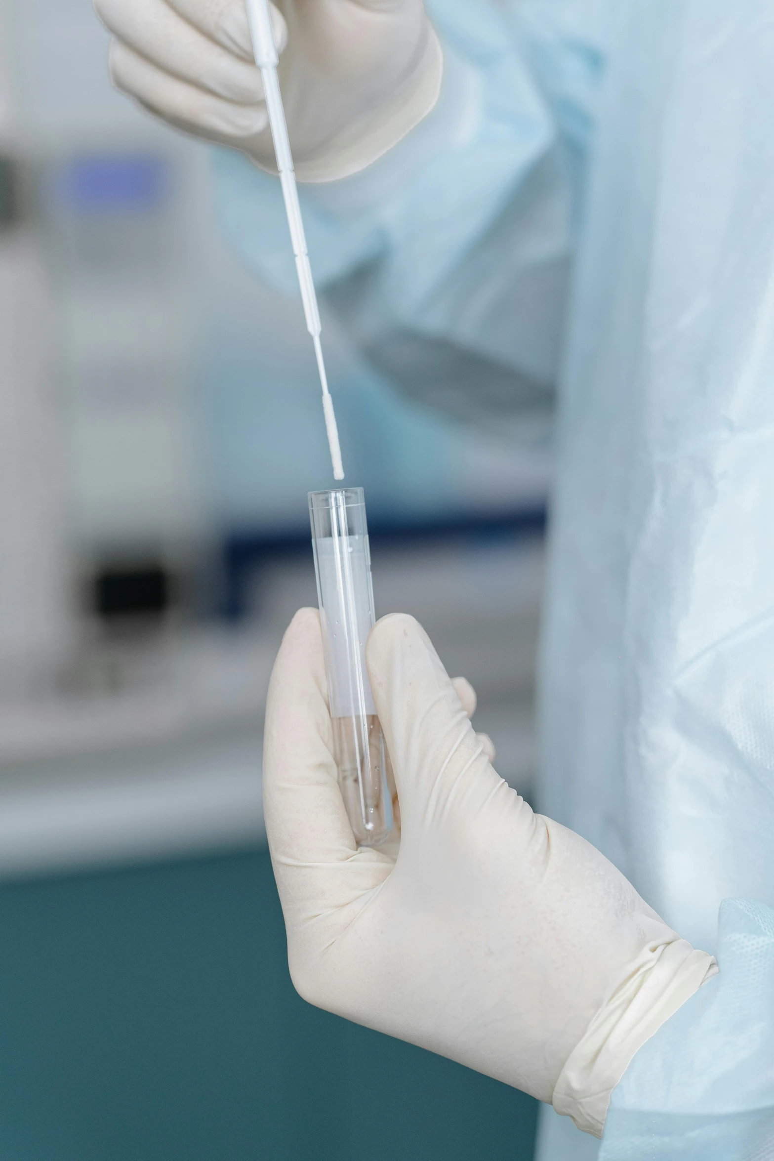 a person in a lab coat holding a tube, zoomed in, iv pole, biomaterial, thumbnail