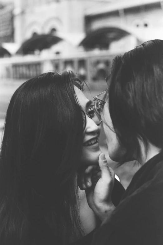 a black and white photo of a man kissing a woman, a black and white photo, tumblr, alena aenami and lilia alvarado, smiling at each other, queer woman, 15081959 21121991 01012000 4k