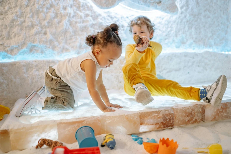 a couple of kids sitting on top of a snow covered ground, a marble sculpture, interactive art, in a beautiful crystal caverine, casual playrix games, toddler, thumbnail