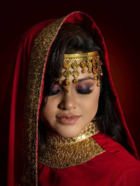 a woman dressed in a red and gold outfit, an album cover, inspired by Osman Hamdi Bey, pexels contest winner, in professional makeup, desi, arabian, bride
