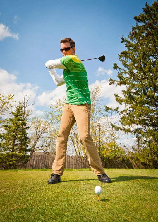 a man swinging a golf club at a golf course, inspired by Sven Nordqvist, happening, avatar image, raphael personnaz, up to the elbow, casually dressed