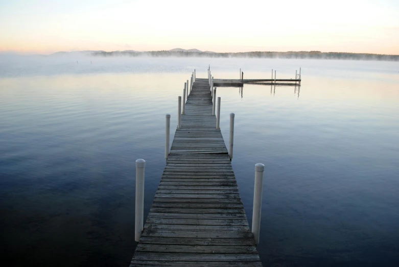 a dock in the middle of a body of water, by Jim Nelson, pexels contest winner, romanticism, wisconsin, 2 5 6 x 2 5 6 pixels, light mist, close scene