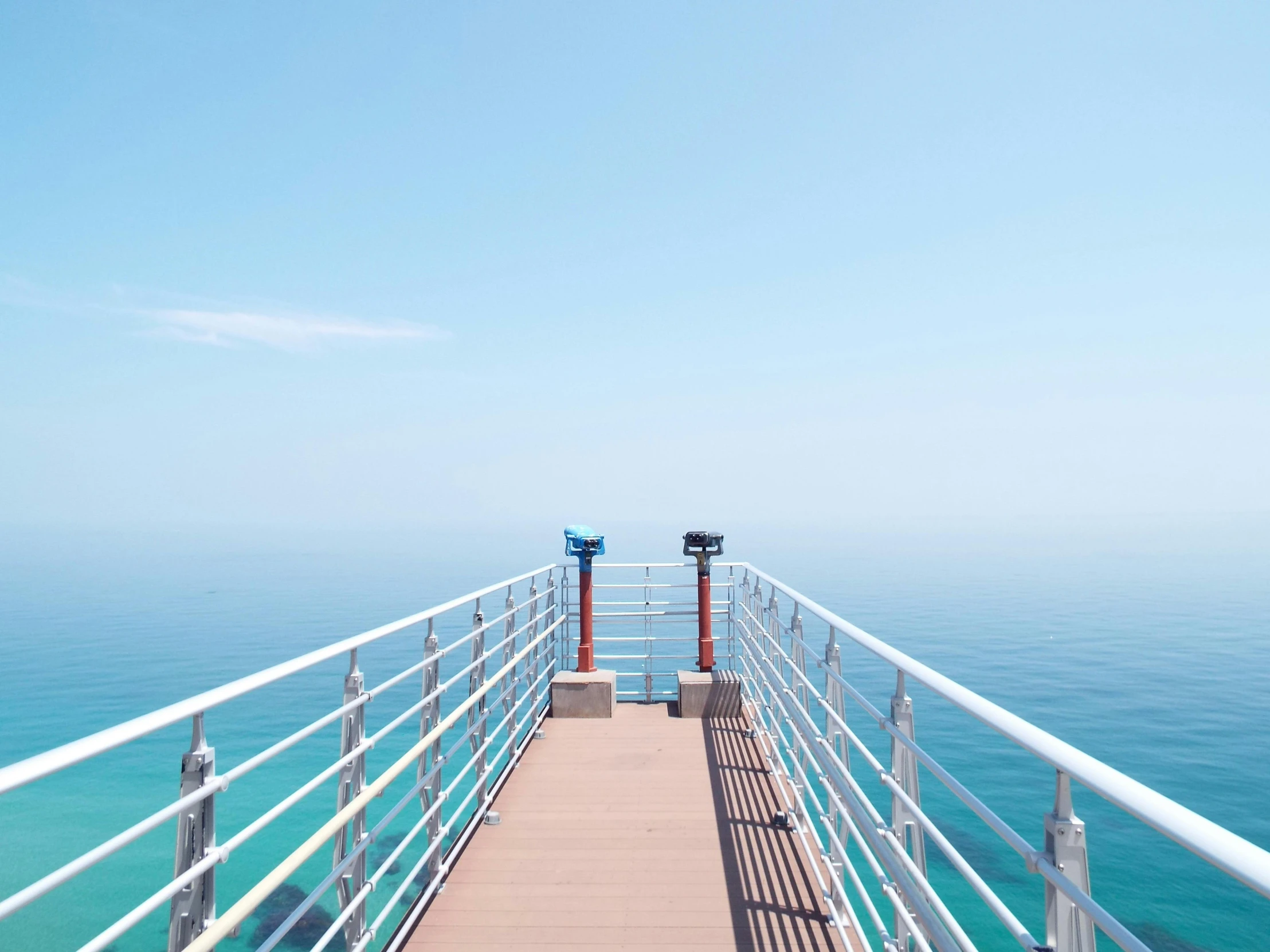 a pier in the middle of a body of water, pexels contest winner, minimalism, light blue clear sky, guardrails, 2 5 6 x 2 5 6 pixels, observation deck