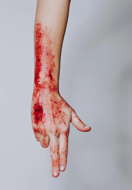 a close up of a person's hand with blood on it, an album cover, pexels, full body image, skin, tall, foam
