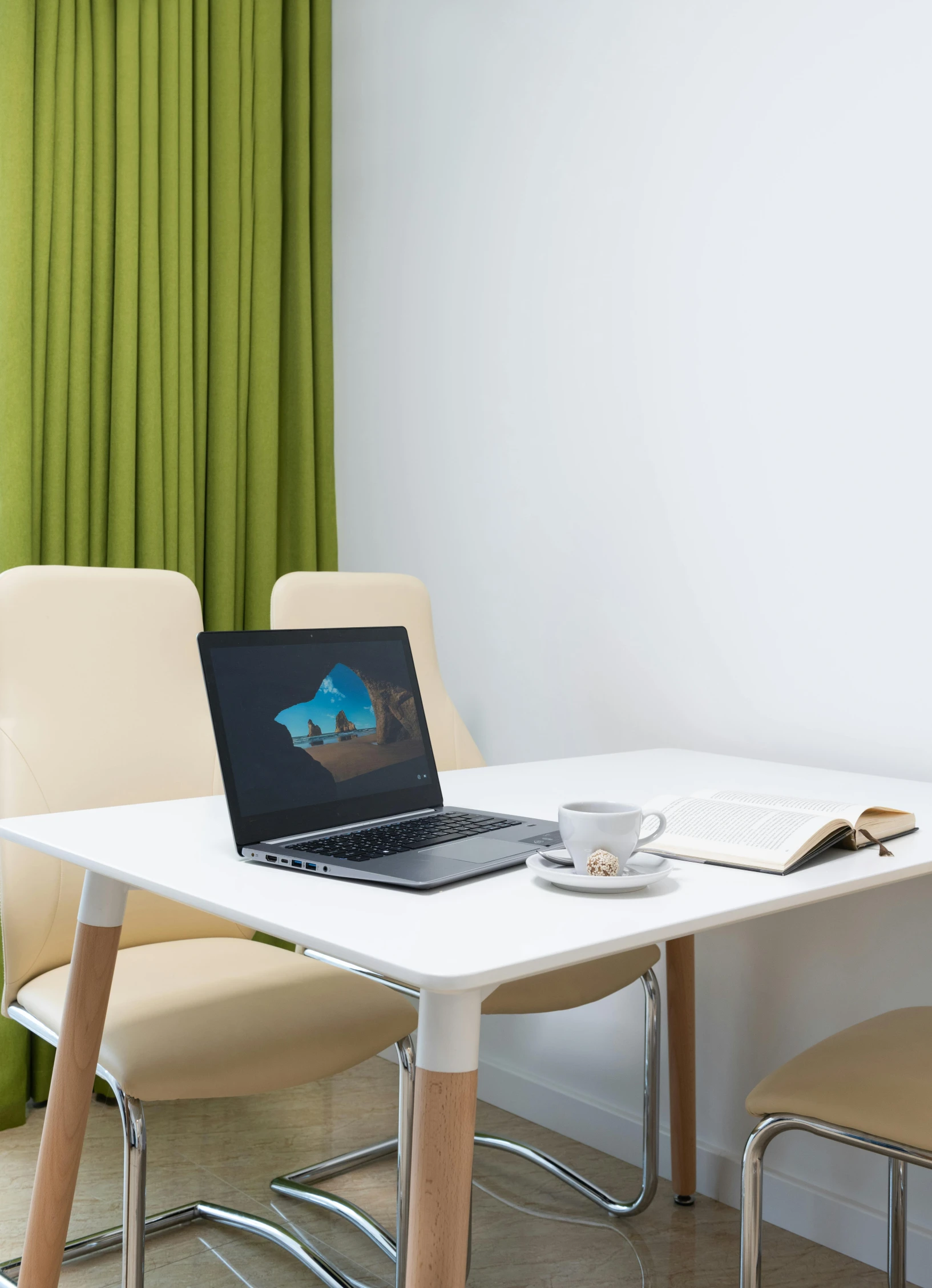 a laptop computer sitting on top of a white table, furnished room, neo kyiv, multiple stories, espoo