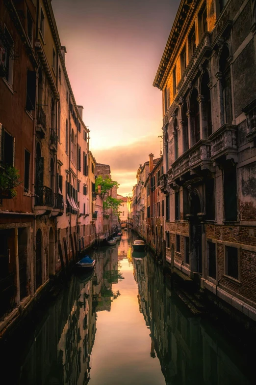 a canal filled with lots of water next to tall buildings, pexels contest winner, renaissance, venice at dusk, shady alleys, color picture, 8 1 5