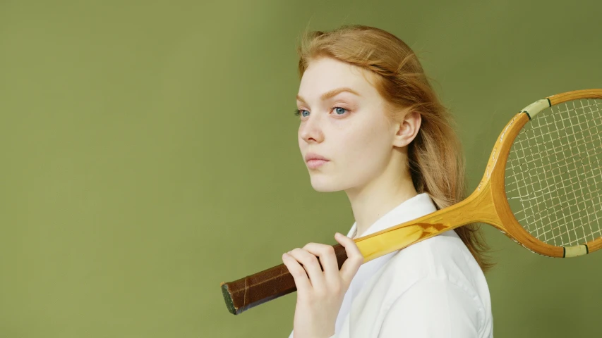 a woman holding a tennis racket over her shoulder, inspired by Artemisia Gentileschi, lime and gold hue, giant wooden club, ellie bamber, baseball bat