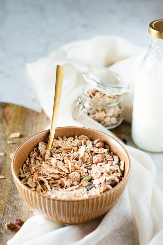 a bowl of oatmeal next to a bottle of milk, trending on pexels, abundant fruition seeds, thumbnail, australia, portrait image