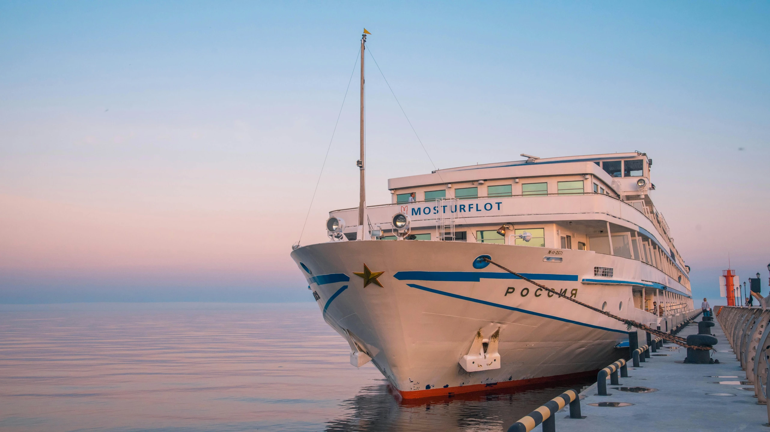 a large white boat sitting on top of a body of water, by Julia Pishtar, vostok-1, at the sunset, avatar image, tourist photo