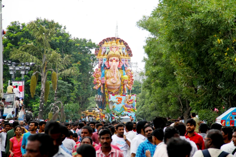 a large crowd of people walking down a street, samikshavad, ganesha, avatar image, square, fan favorite