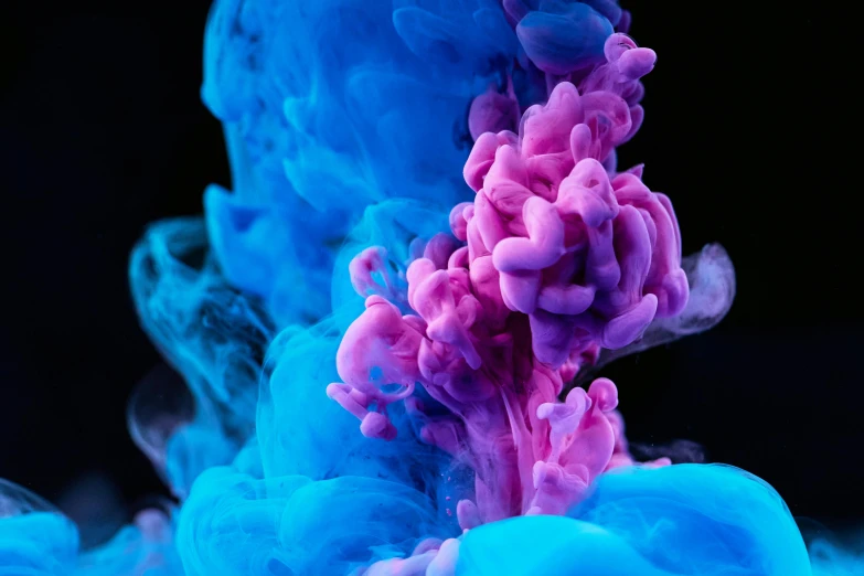 a close up of a blue and pink substance, inspired by Kim Keever, pexels contest winner, high contrast colours, beeple and james jean, cmyk, liquid smoke