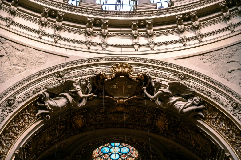 a close up of a stained glass window in a building, a marble sculpture, inspired by Gian Lorenzo Bernini, pexels contest winner, high arched ceiling, 2 5 6 x 2 5 6 pixels, splendid haussmann architecture, monserrat gudiol