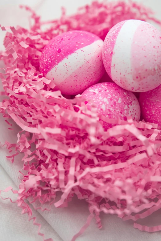 a nest filled with pink and white speckled eggs, inspired by Peter Alexander Hay, hot pink, closeup of an adorable, white neon wash, she