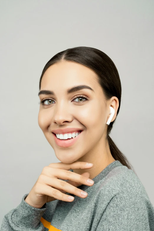 a woman brushing her teeth with an electric toothbrush, trending on pexels, renaissance, earbuds jewelry, halfbody headshot, on white, madison beer girl portrait