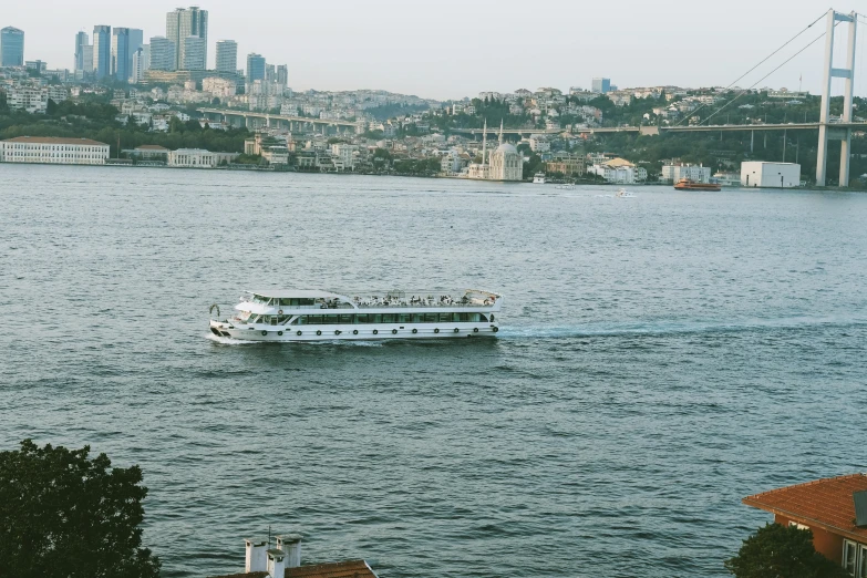 a large boat traveling across a large body of water, by Lubin Baugin, pexels contest winner, hurufiyya, surrounding the city, demna gvasalia, white, high quality image”