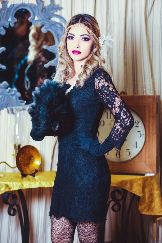 a woman in a black dress standing in front of a clock, inspired by Nina Petrovna Valetova, pexels contest winner, baroque, velvet with lace gown, 1 9 2 0 s style, a blond, black gloves