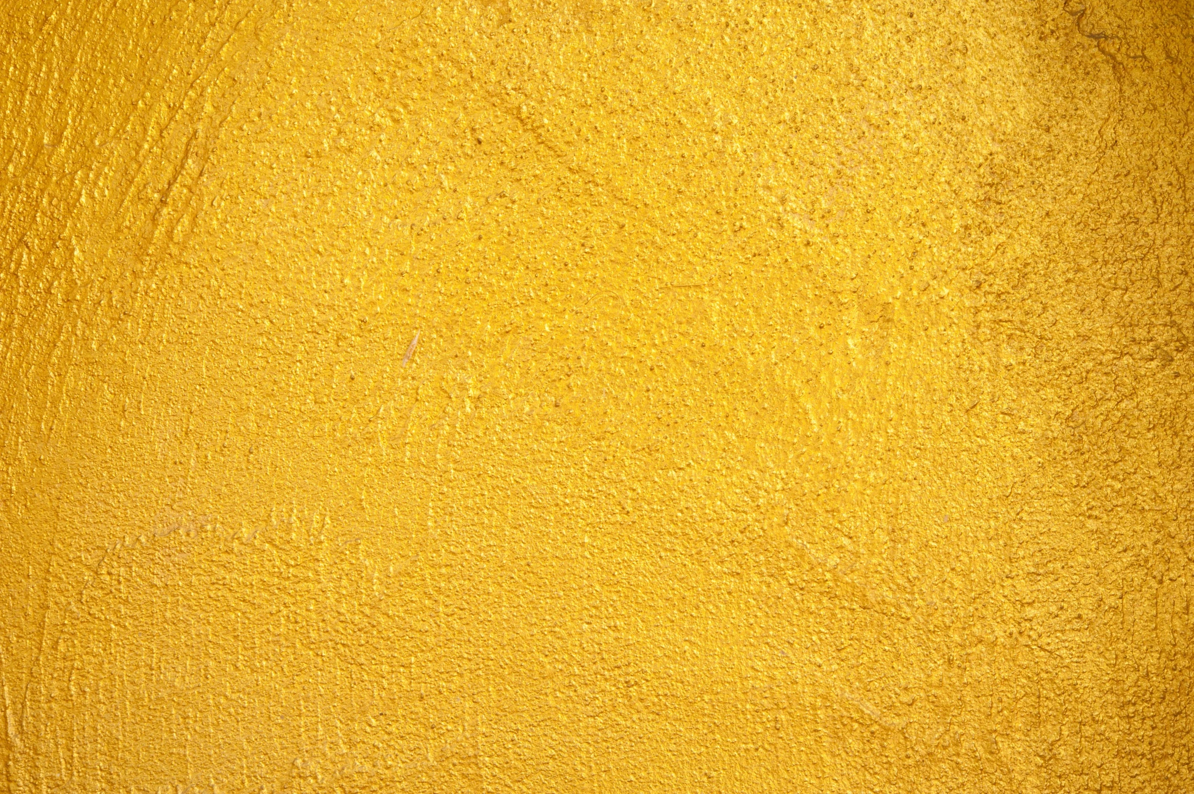 a red fire hydrant sitting in front of a yellow wall, an album cover, inspired by Frank O'Meara, minimalism, skin texture natural, hi - res textures, gold silk, cement