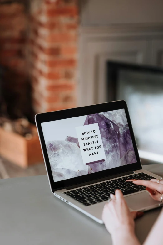 a woman sitting in front of a laptop computer, by Carey Morris, trending on pexels, mystical setting, subtitles, website banner, full frame image