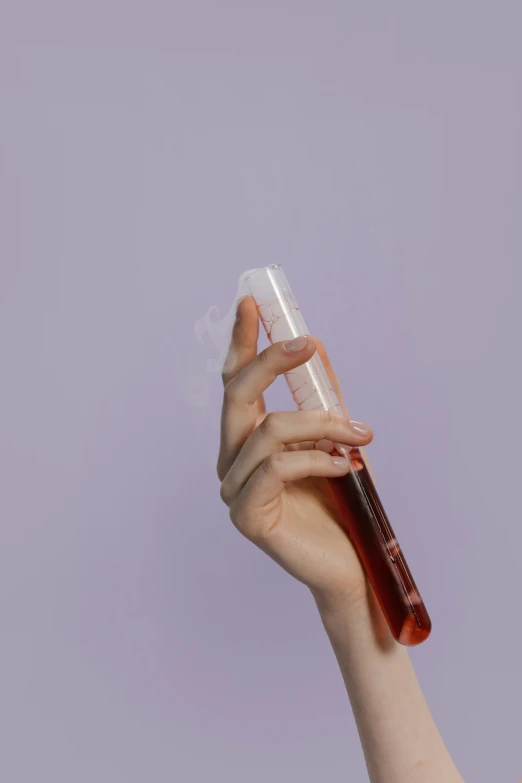 a close up of a person holding a bottle of liquid, by Carey Morris, purple tubes, minimalistic background, transparent, maroon mist