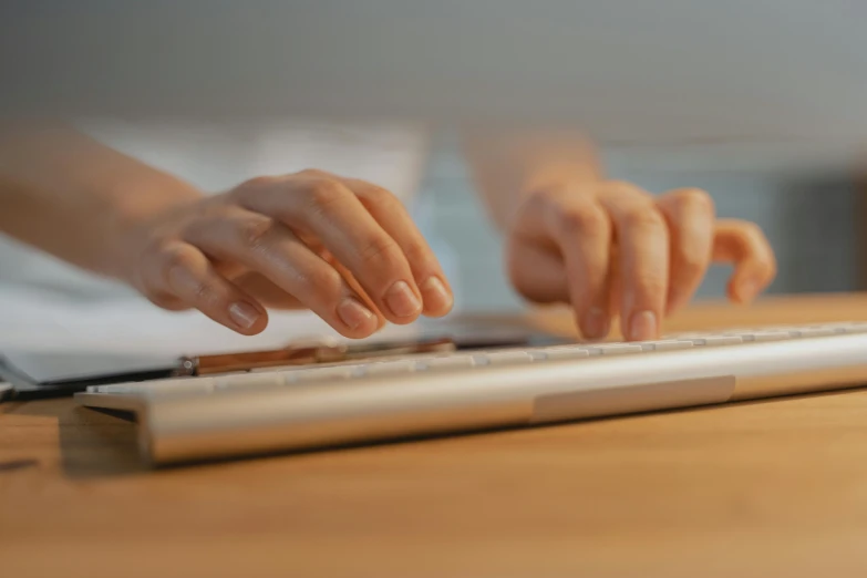 a close up of a person typing on a keyboard, a digital rendering, pexels, brown, épaule devant pose, a long-shot, with index finger