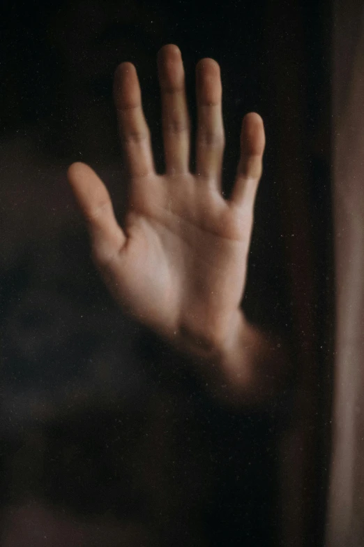 a person's hand reaching out of a window, a picture, inspired by Elsa Bleda, pexels, hurufiyya, face partially obscured, 5 fingers). full body, worried, palm body