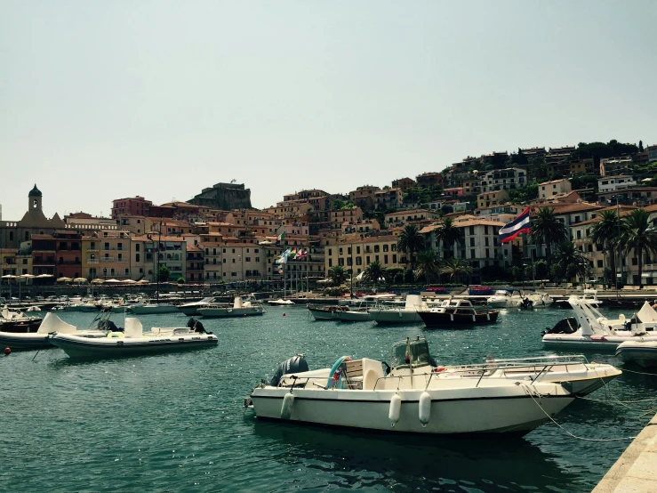 a number of boats in a body of water, pexels contest winner, renaissance, chris pratt ancient corsican, square, low quality photo, thumbnail