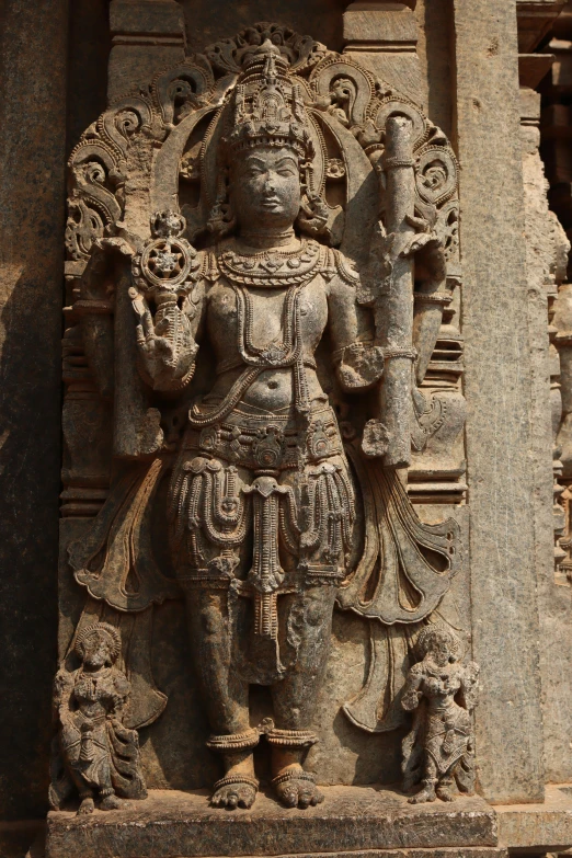 a close up of a statue of a person, by T. K. Padmini, renaissance, castles and temple details, figure in center, hips, sun god