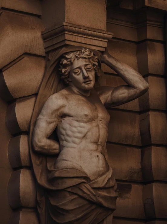 a statue of a man on the side of a building, inspired by Sir Jacob Epstein, pexels contest winner, neoclassicism, shirtless :: high detail, glasgow, creepy carved expression, tanned